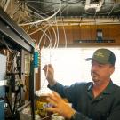 Frank Mitloehner working with gas analyzers at UC Davis